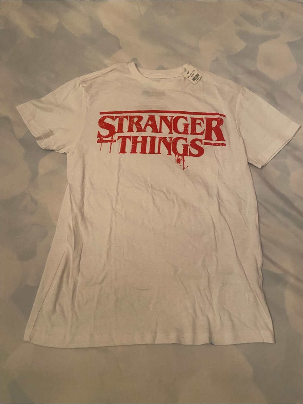✨Bundle: Buy 6 for $80

❤️Stranger Things White Graphic Tee with Red Logo!